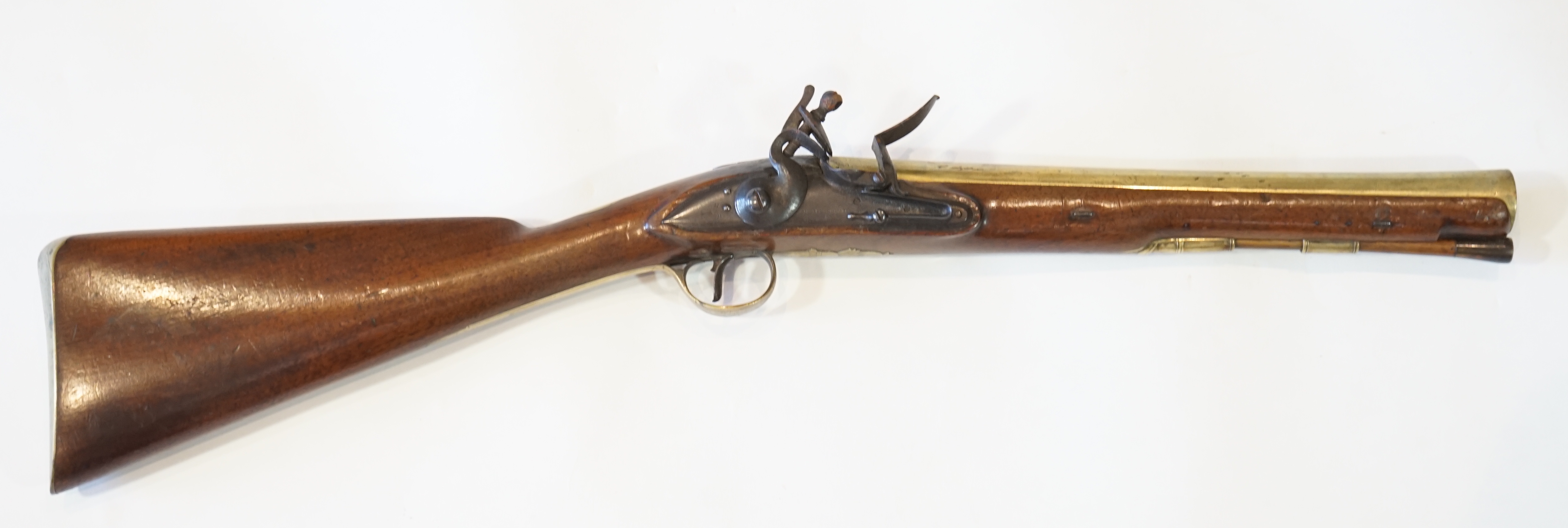 An English brass barrel flintlock blunderbuss by H W Mortimer, late 18th century